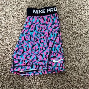 super fun nike pros!! girls size large but can fit XS/S women if needed